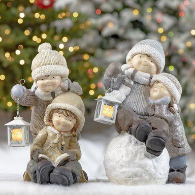 Boy and Girl Playing in the Snow